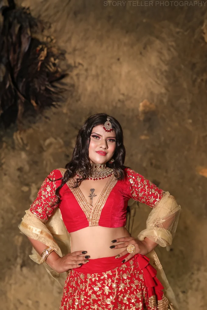 2)Classic Indian woman in a red and gold lehenga, smiling with self-confidence with cultural poise